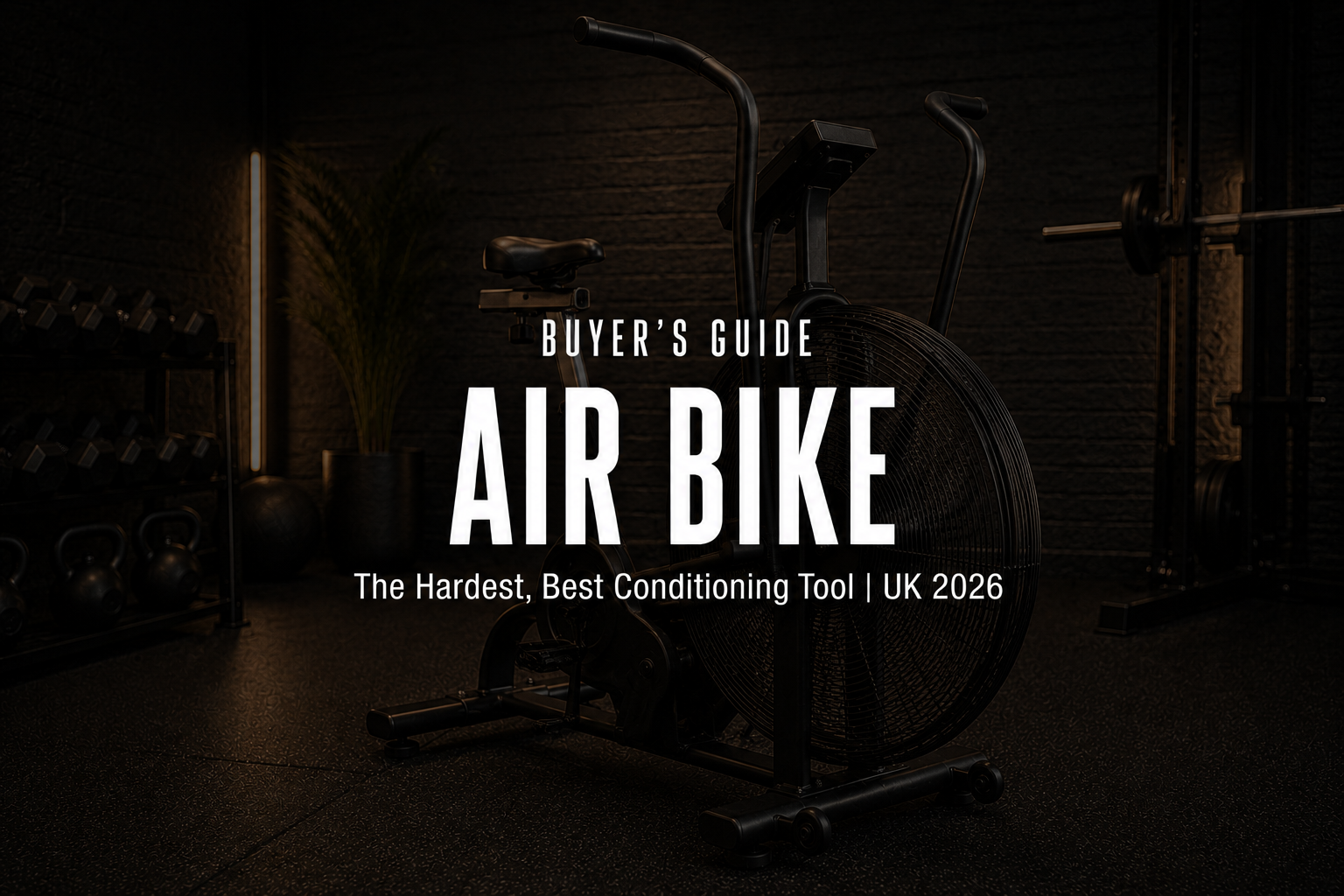 Premium black commercial air bike with large front fan in a high-end home gym