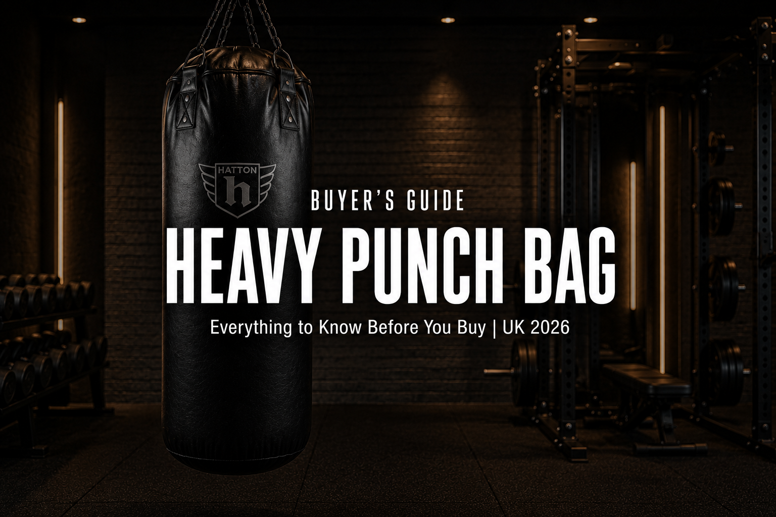Premium black leather heavy punch bag hanging from a chain in a high-end UK home gym