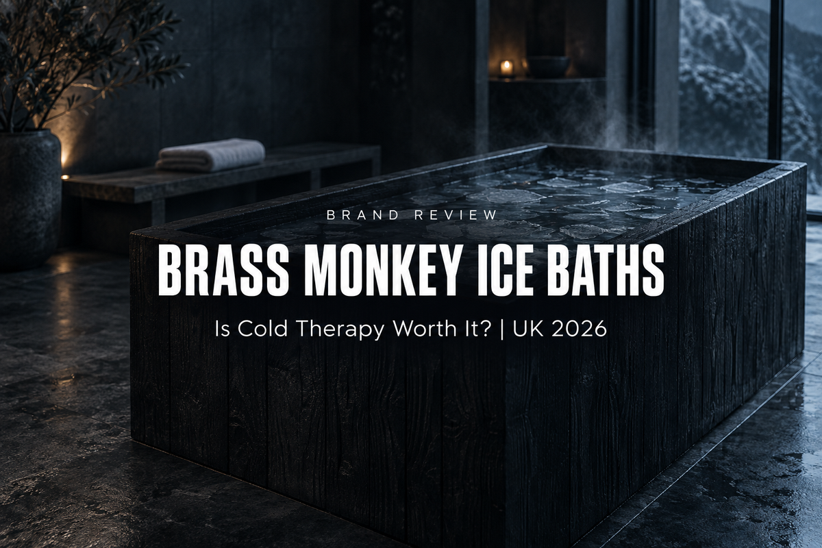 Dark charred timber clad cold plunge ice bath with broken ice sheets floating on the water in a premium UK recovery room