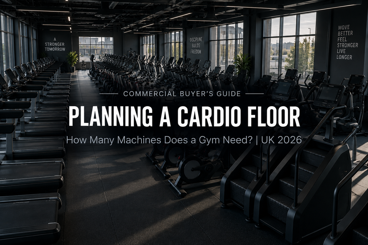 An elevated view of a commercial gym cardio floor with rows of treadmills, bikes and stepmills and clear walkways between them