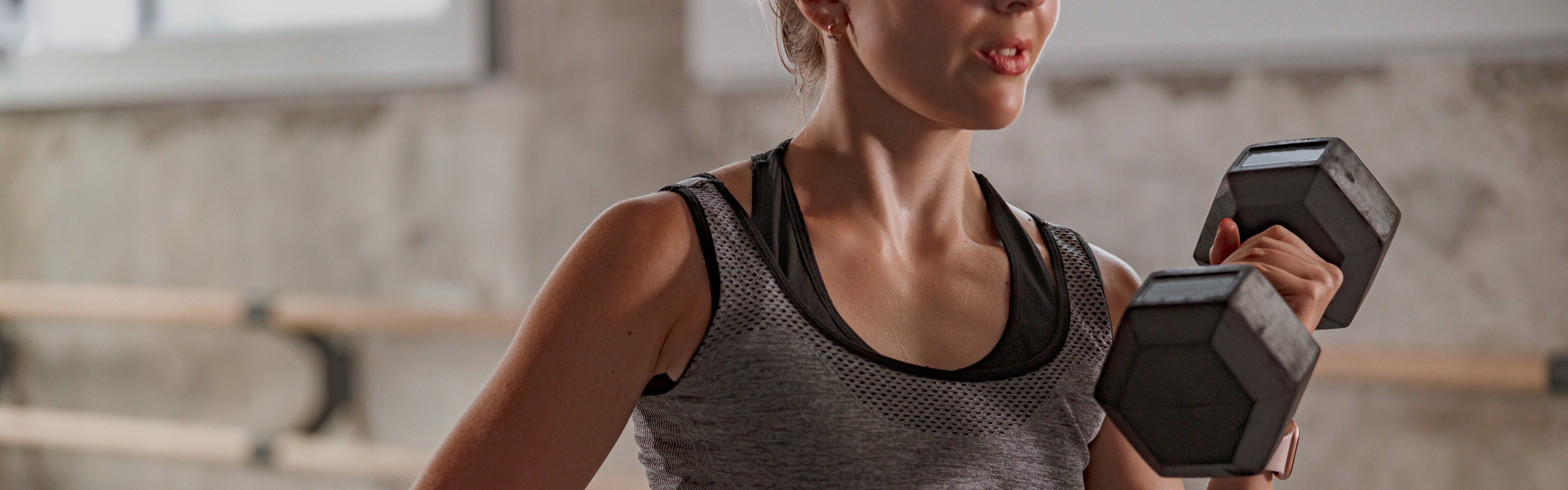 Women lifting dumbbell