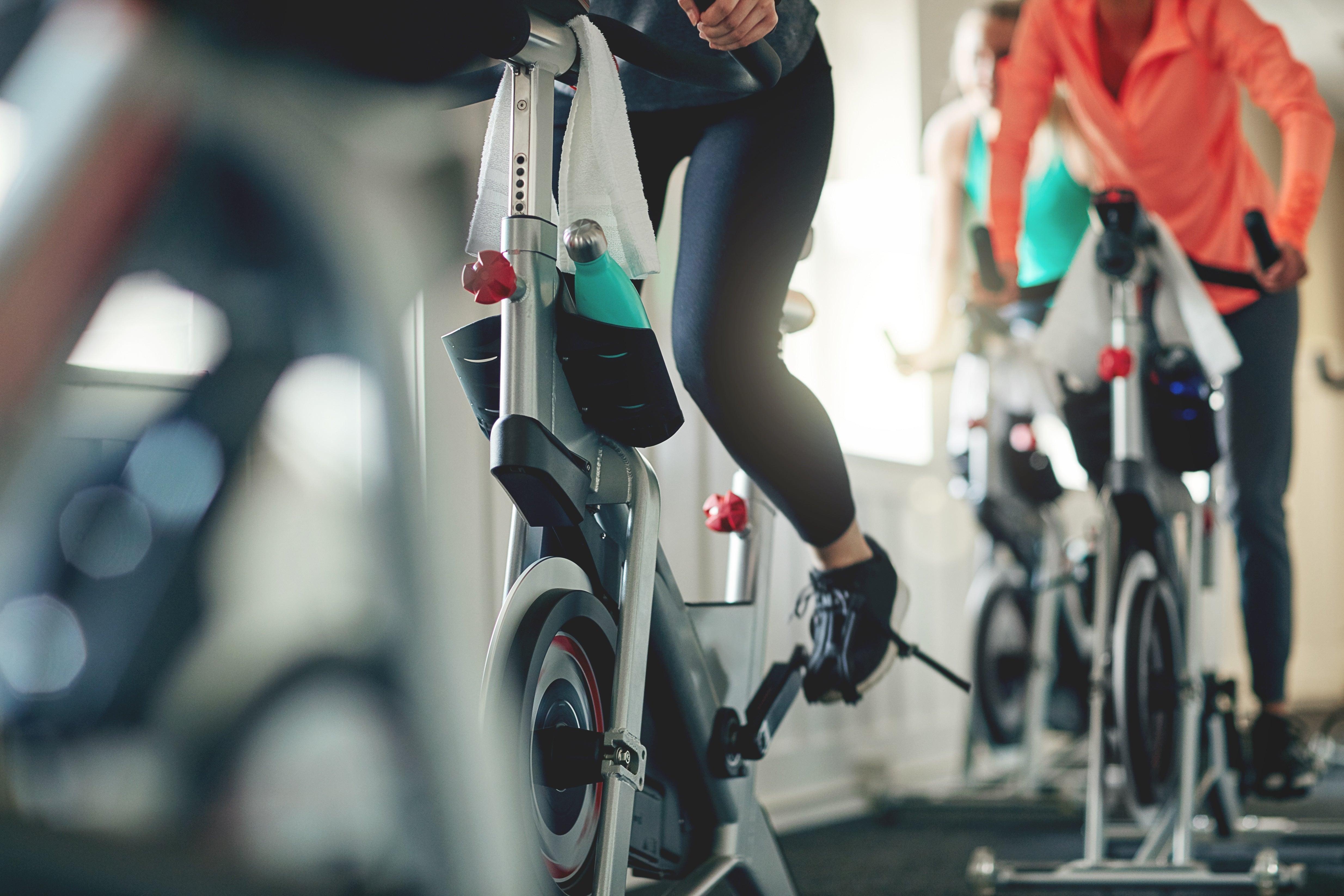 person riding spin bike