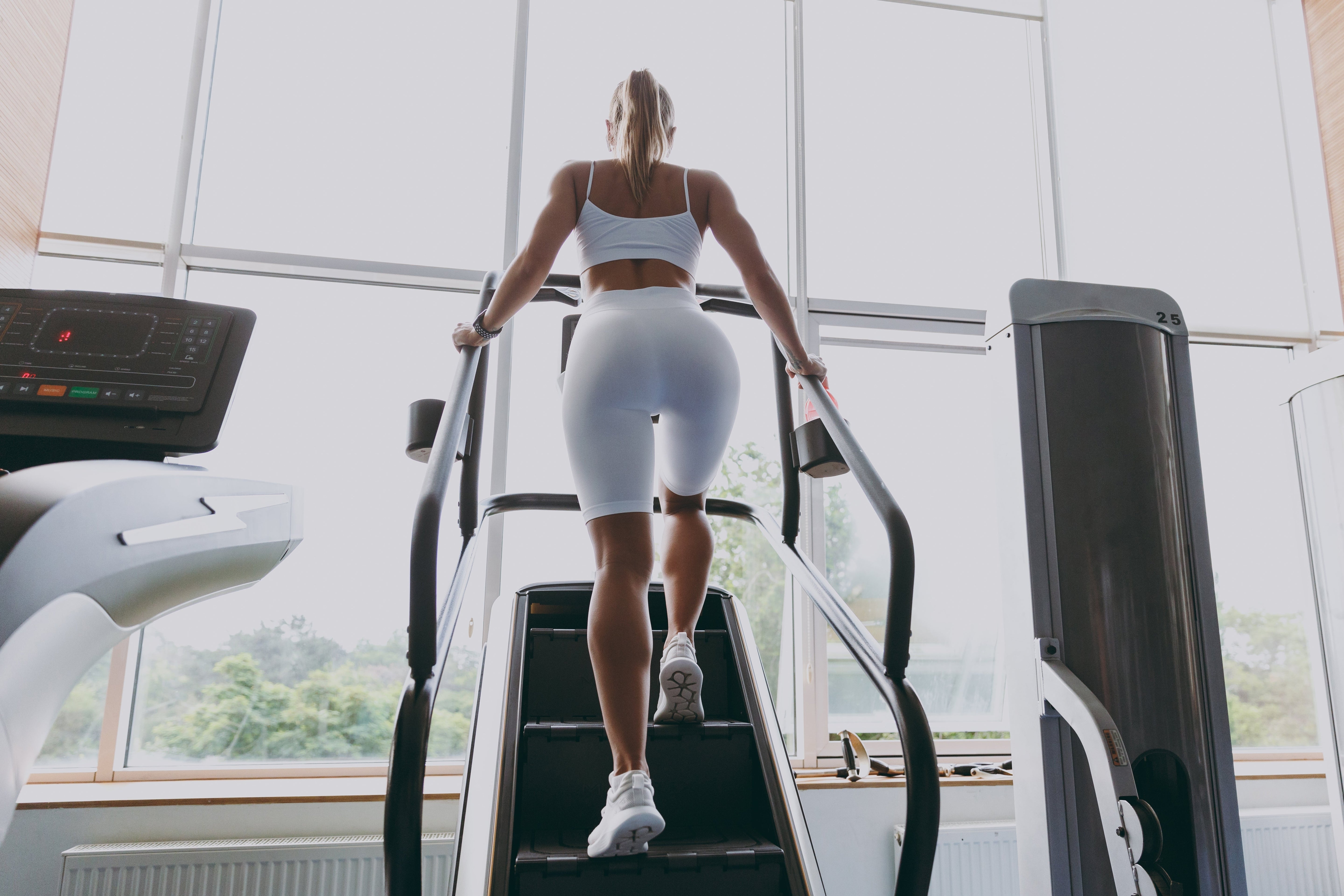 women using stair climber