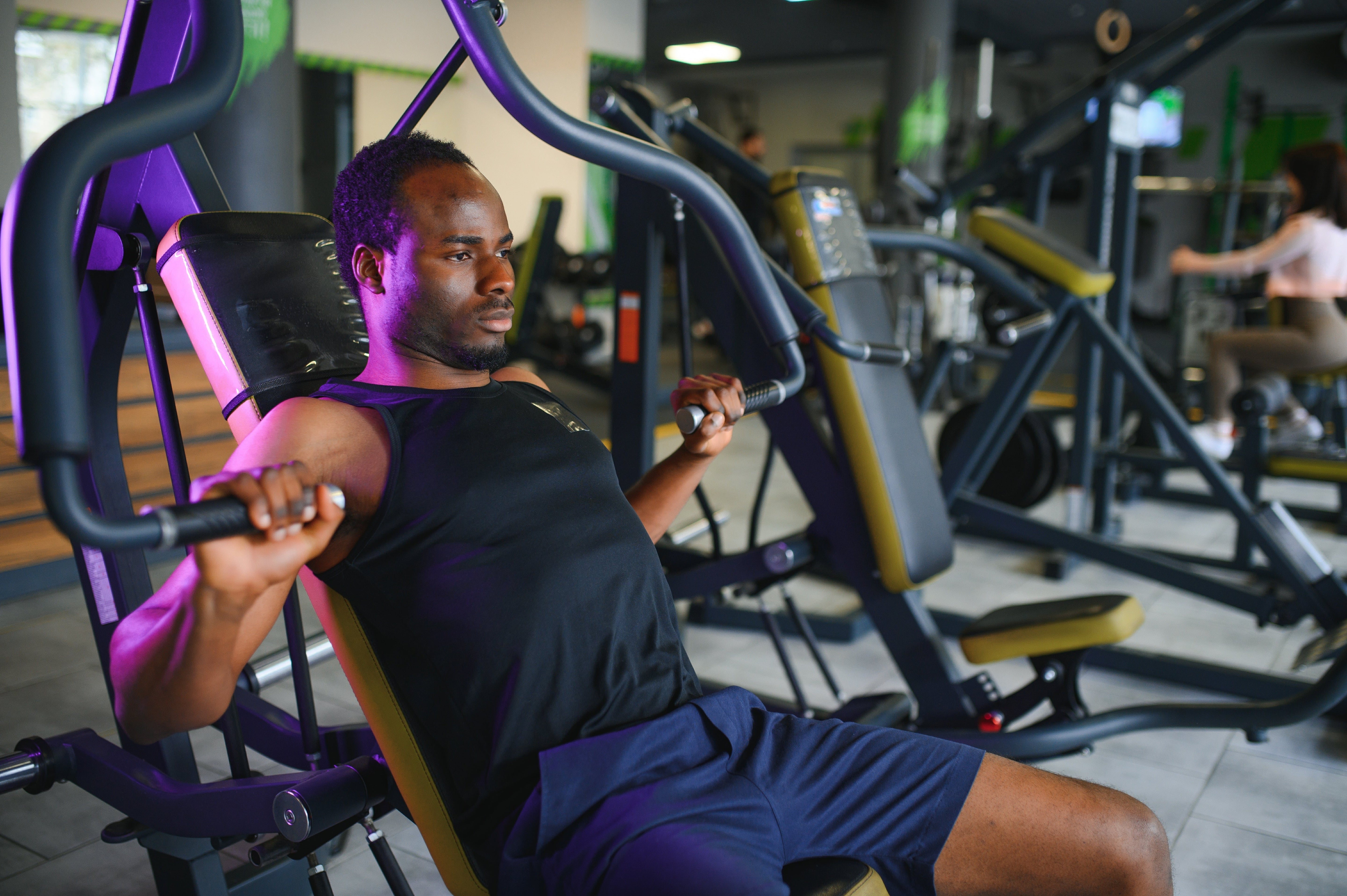 Man using chest press machine